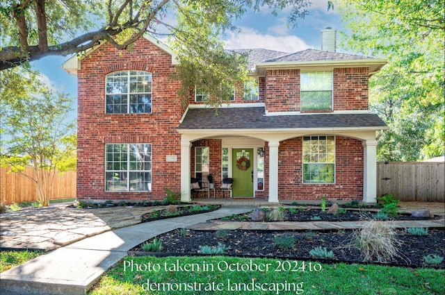 view of property featuring a porch