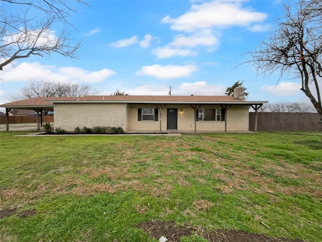 ranch-style house featuring a front lawn