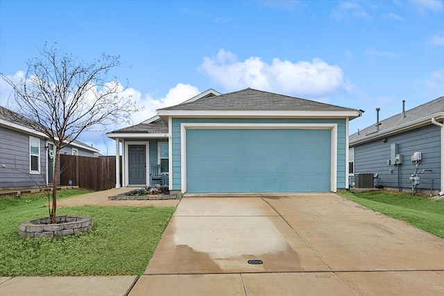 single story home with central AC unit, a garage, and a front lawn