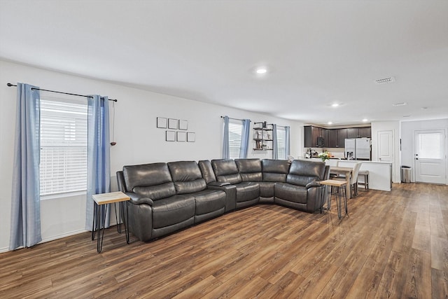 living room featuring dark hardwood / wood-style floors