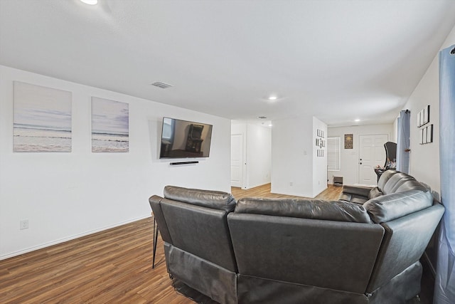 living room with hardwood / wood-style floors