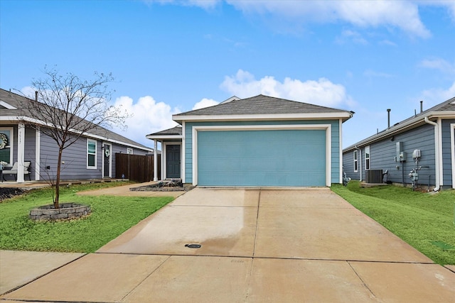 single story home featuring a garage, central air condition unit, and a front lawn