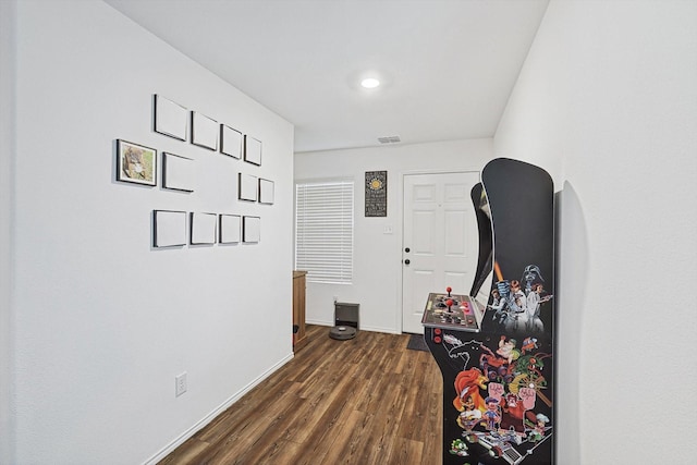 hall featuring dark wood-type flooring