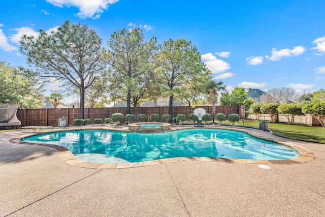 view of pool featuring an in ground hot tub and a patio