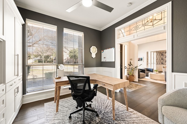 office space with crown molding, ceiling fan, and dark hardwood / wood-style floors