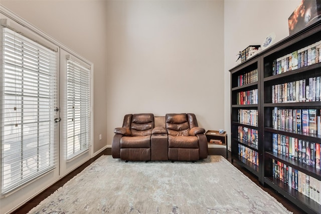 sitting room featuring dark hardwood / wood-style floors