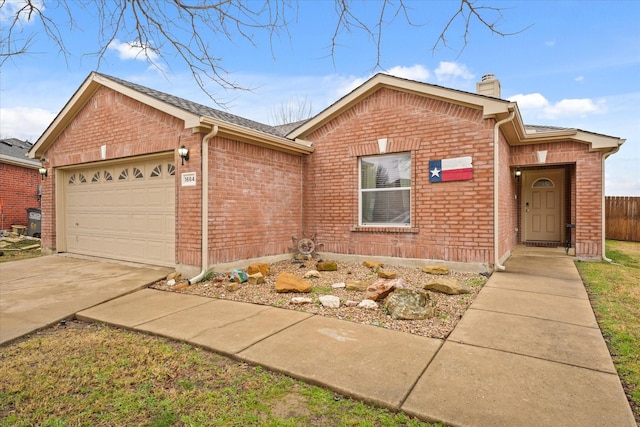 ranch-style house featuring a garage