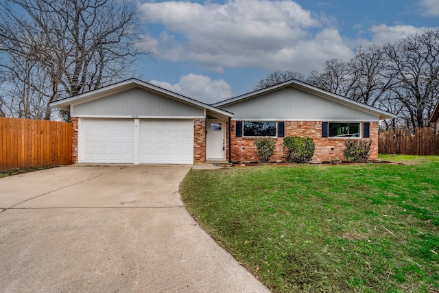 single story home featuring fence, driveway, a front lawn, a garage, and brick siding