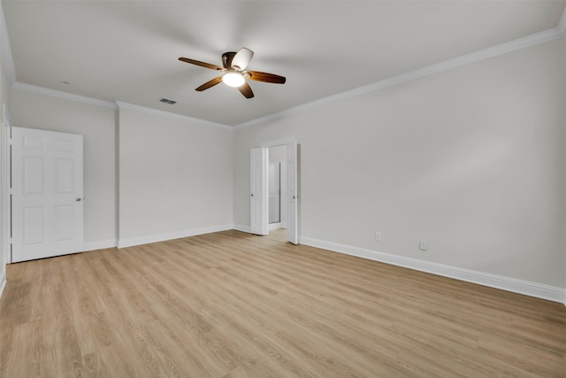 empty room featuring ornamental molding, ceiling fan, and light hardwood / wood-style flooring