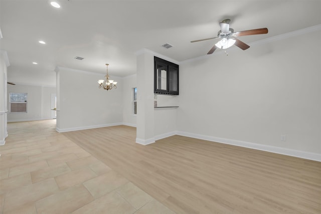 unfurnished room featuring ornamental molding, ceiling fan with notable chandelier, and light wood-type flooring