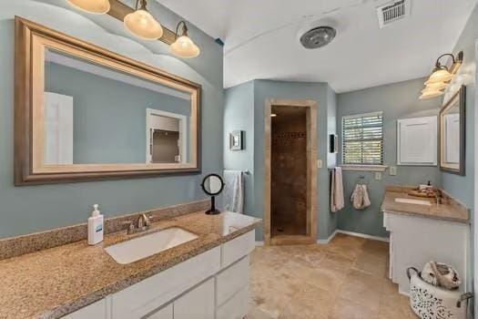 12 Brookhaven Dr, Lucas, TX 75002 - bathroom featuring vanity, a stall shower, tile patterned floors, and baseboards