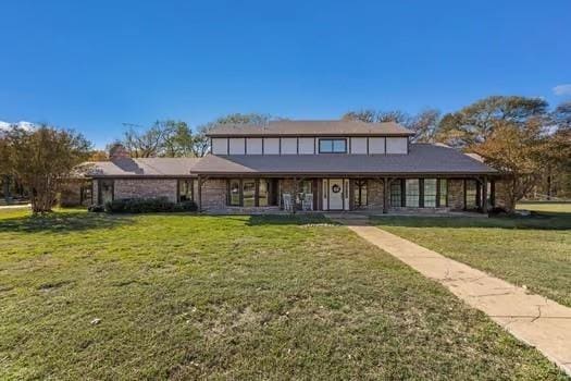 view of front of home with a front lawn