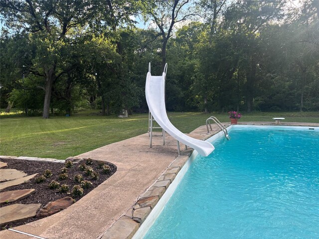 12 Brookhaven Dr, Lucas, TX 75002 - swimming pool with a water slide, a yard, a diving board, and a patio area