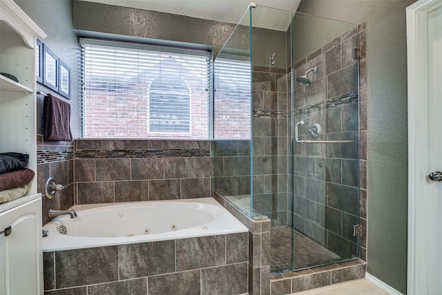 bathroom featuring vanity, shower with separate bathtub, and tile patterned flooring