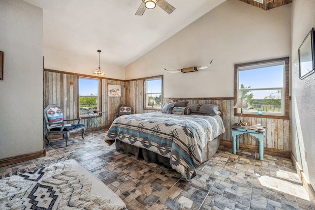 bedroom featuring high vaulted ceiling