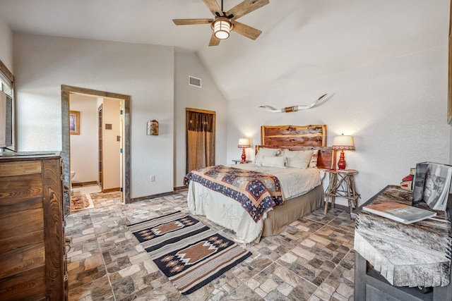 bedroom with high vaulted ceiling and ceiling fan