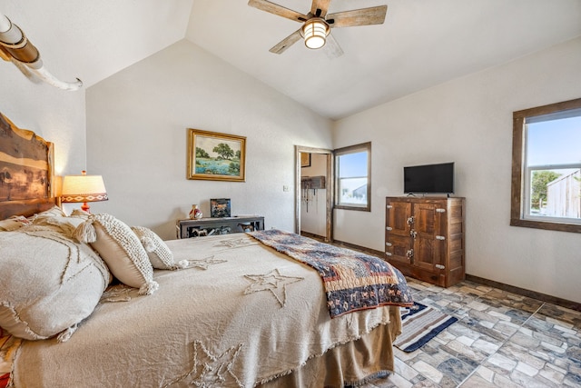 bedroom featuring ceiling fan and lofted ceiling