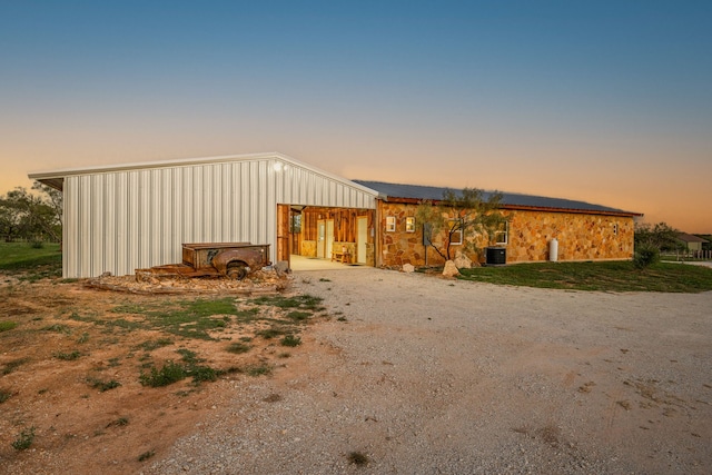 view of front of home with central AC unit