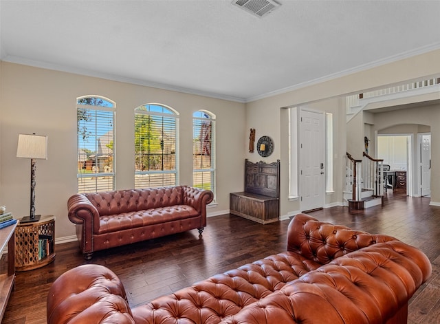 living room featuring crown molding and dark hardwood / wood-style flooring