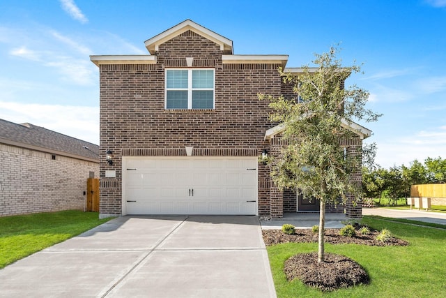 view of front of property with a garage and a front yard