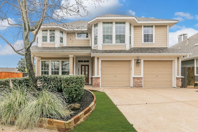 view of front of home with a garage