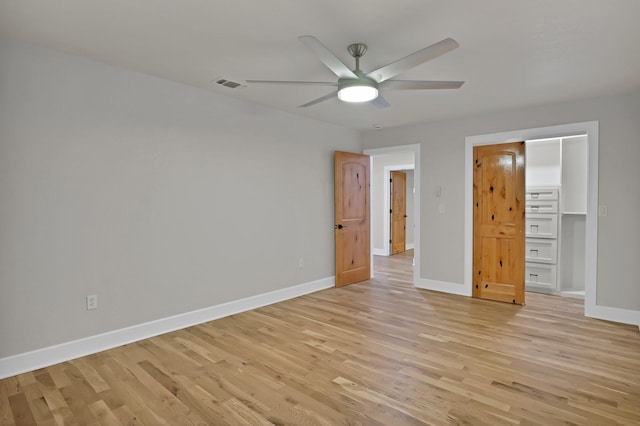 unfurnished bedroom featuring ceiling fan and light hardwood / wood-style floors