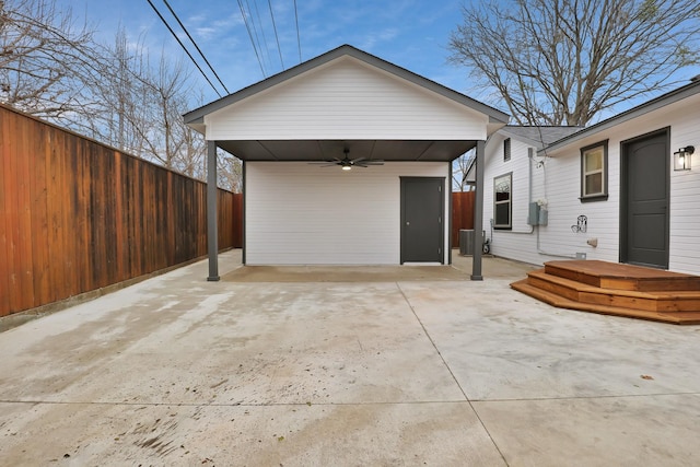 exterior space featuring ceiling fan