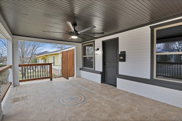 view of patio featuring covered porch and ceiling fan