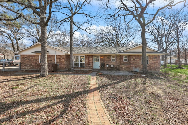 single story home with a patio