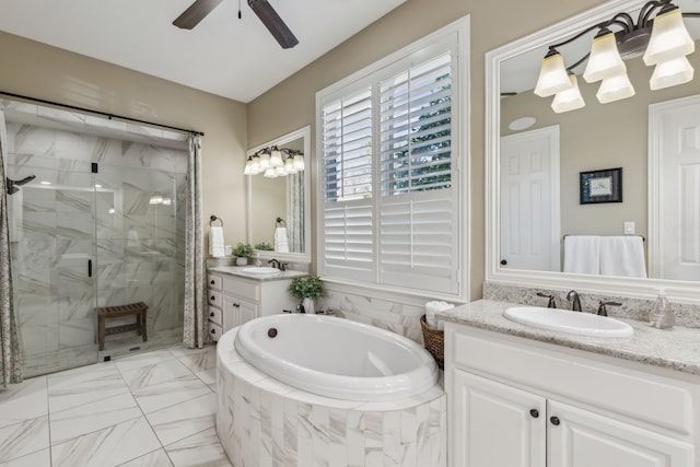 bathroom featuring a garden tub, a sink, a shower stall, and ceiling fan