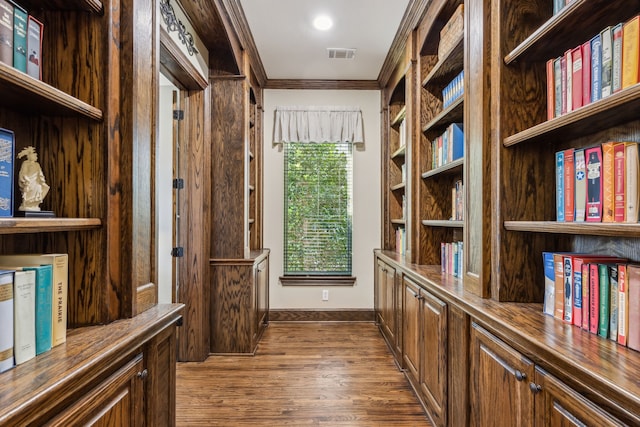 interior space with dark wood-style flooring and visible vents