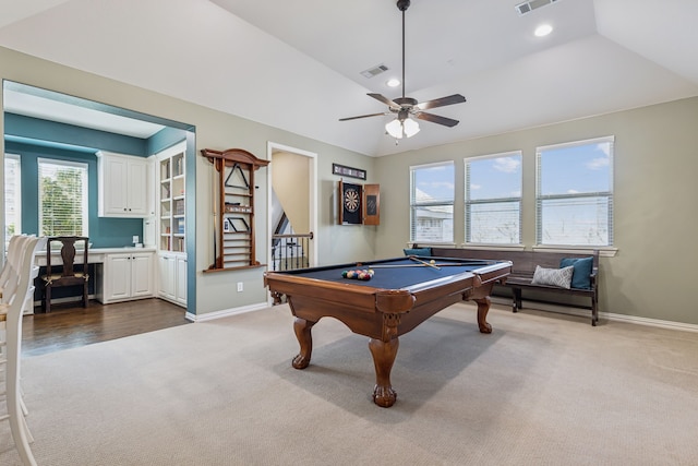 game room with carpet floors, visible vents, and vaulted ceiling