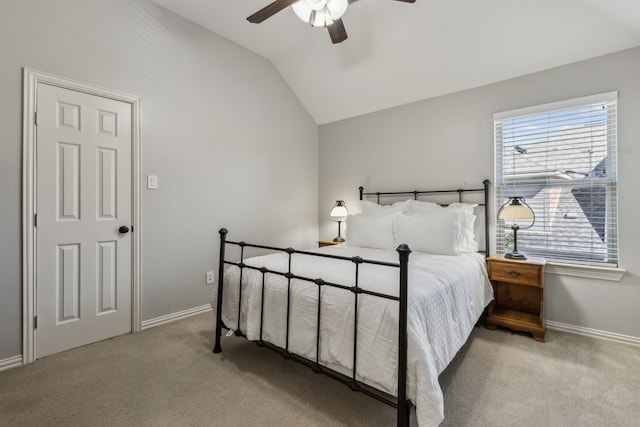 bedroom with lofted ceiling, carpet, baseboards, and a ceiling fan