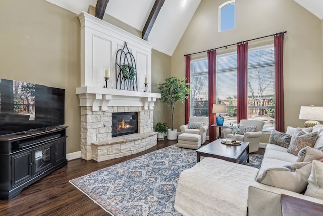 living area featuring a fireplace, dark wood finished floors, high vaulted ceiling, beamed ceiling, and baseboards