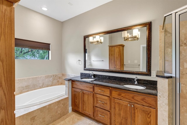6039 Reiger Ave, Dallas, TX 75214 - full bath featuring double vanity, a garden tub, tile patterned flooring, and a sink