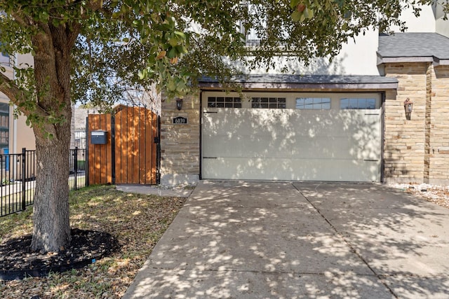 6039 Reiger Ave, Dallas, TX 75214 - exterior space featuring fence, driveway, and a gate