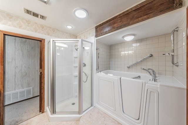 bathroom featuring separate shower and tub and tile patterned flooring