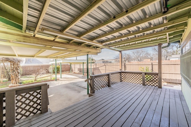 wooden deck with a patio