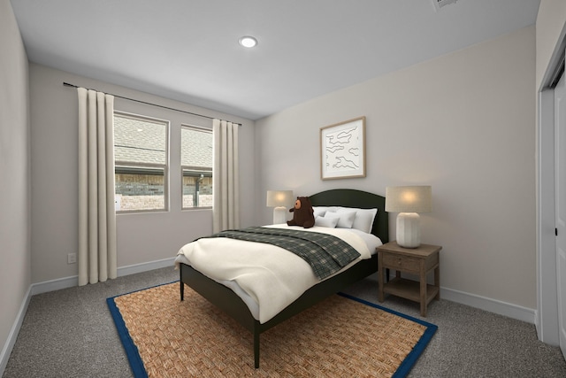 carpeted bedroom featuring recessed lighting and baseboards