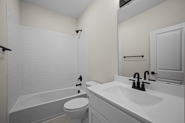 bathroom with tile patterned floors, toilet, vanity, and bathing tub / shower combination