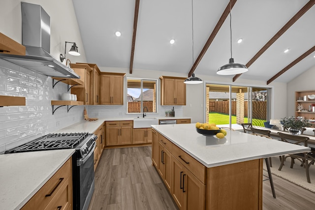 kitchen with open shelves, a sink, stainless steel gas range, beamed ceiling, and ventilation hood