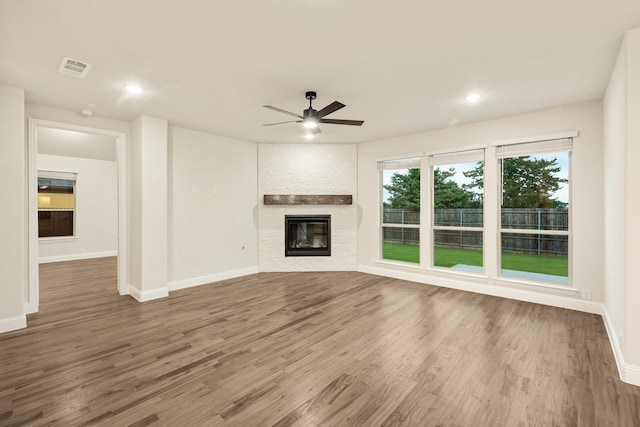 1130 Cardinal Dr, Midlothian, TX 76065 - unfurnished living room with ceiling fan, wood finished floors, baseboards, and recessed lighting