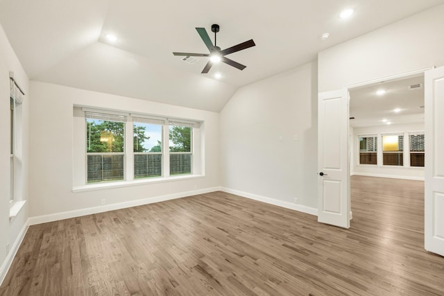 1130 Cardinal Dr, Midlothian, TX 76065 - unfurnished room featuring ceiling fan, vaulted ceiling, wood finished floors, recessed lighting, and baseboards