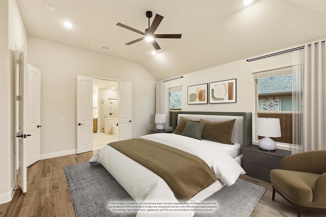 1130 Cardinal Dr, Midlothian, TX 76065 - bedroom with lofted ceiling, wood finished floors, baseboards, connected bathroom, and ceiling fan