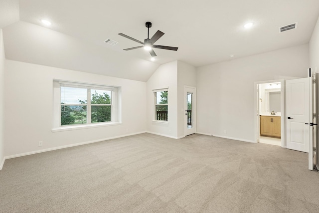 1130 Cardinal Dr, Midlothian, TX 76065 - unfurnished bedroom featuring lofted ceiling, light carpet, baseboards, ensuite bath, and a ceiling fan