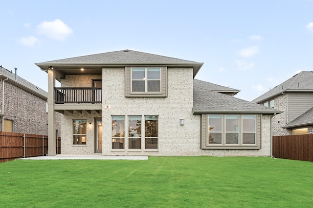 1130 Cardinal Dr, Midlothian, TX 76065 - back of property featuring a balcony, brick siding, a patio area, and a shingled roof