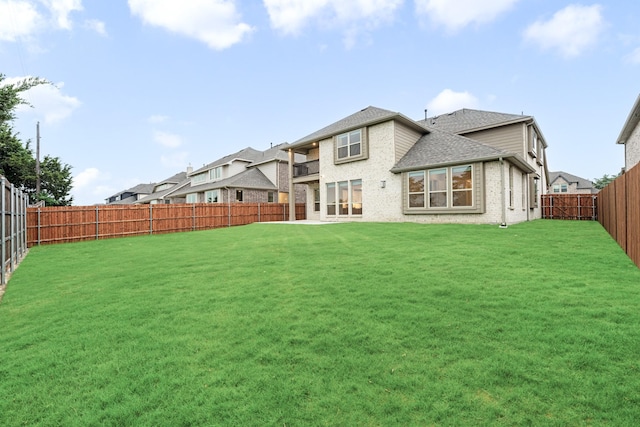 1130 Cardinal Dr, Midlothian, TX 76065 - back of house with brick siding and roof with shingles