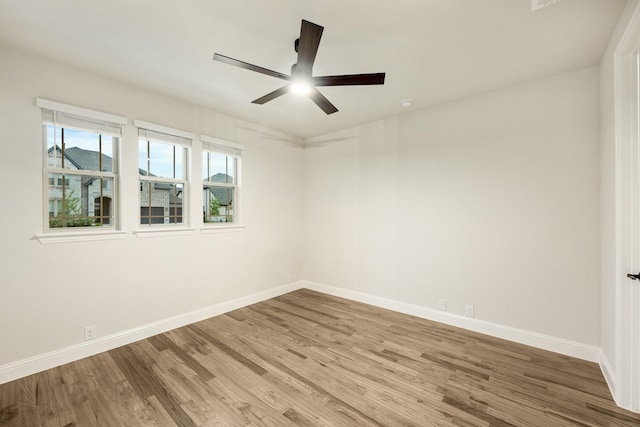 1130 Cardinal Dr, Midlothian, TX 76065 - spare room featuring baseboards, wood finished floors, and ceiling fan