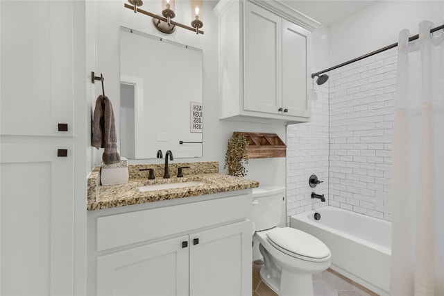 full bathroom with vanity, tile patterned floors, toilet, and shower / bath combo