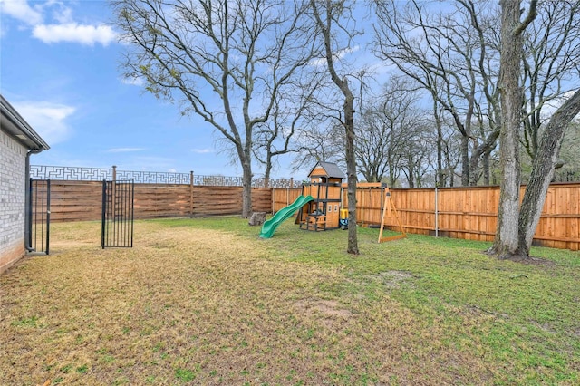 view of yard featuring a playground